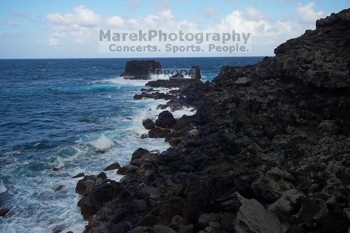 Hike to the Nakalele blowholes along the surf-beaten lava formations.

Filename: SRM_20071219_1338136.jpg
Aperture: f/10.0
Shutter Speed: 1/1000
Body: Canon EOS-1D Mark II
Lens: Sigma 15-30mm f/3.5-4.5 EX Aspherical DG DF