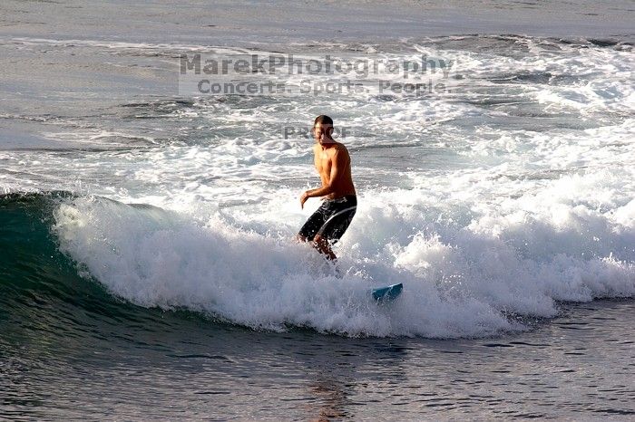 Surfers in Honolua Bay, Maui, Hawai'i, 2007.

Filename: SRM_20071217_1631390.jpg
Aperture: f/8.0
Shutter Speed: 1/1250
Body: Canon EOS 20D
Lens: Canon EF 300mm f/2.8 L IS