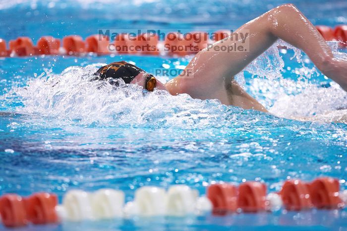 UT sophomore Trey Hoover took fifth in the 1000 yard freestyle with a time of 9:47.70.  The University of Texas Longhorns defeated The University of Georgia Bulldogs 157-135 on Saturday, January 12, 2008.

Filename: SRM_20080112_1111342.jpg
Aperture: f/2.8
Shutter Speed: 1/400
Body: Canon EOS-1D Mark II
Lens: Canon EF 300mm f/2.8 L IS