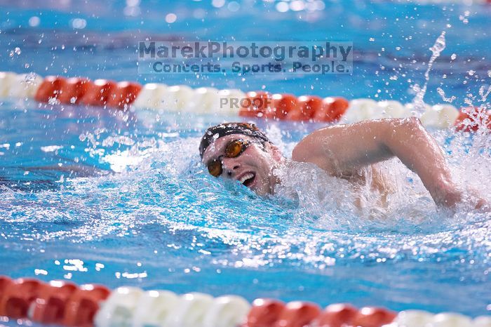 UT sophomore Trey Hoover took fifth in the 1000 yard freestyle with a time of 9:47.70.  The University of Texas Longhorns defeated The University of Georgia Bulldogs 157-135 on Saturday, January 12, 2008.

Filename: SRM_20080112_1111508.jpg
Aperture: f/2.8
Shutter Speed: 1/400
Body: Canon EOS-1D Mark II
Lens: Canon EF 300mm f/2.8 L IS