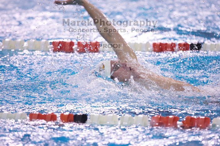 Georgia's Chris Spooner took fifth in the 100 yard backstroke with a time of 52.45.  The University of Texas Longhorns defeated The University of Georgia Bulldogs 157-135 on Saturday, January 12, 2008.

Filename: SRM_20080112_1123249.jpg
Aperture: f/2.8
Shutter Speed: 1/400
Body: Canon EOS-1D Mark II
Lens: Canon EF 300mm f/2.8 L IS