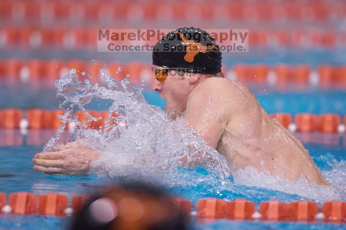 UT senior Matthew Lowe took first in the 200 yard breaststroke with a time of 2:01.46.  The University of Texas Longhorns defeated The University of Georgia Bulldogs 157-135 on Saturday, January 12, 2008.

Filename: SRM_20080112_1200504.jpg
Aperture: f/2.8
Shutter Speed: 1/400
Body: Canon EOS-1D Mark II
Lens: Canon EF 300mm f/2.8 L IS