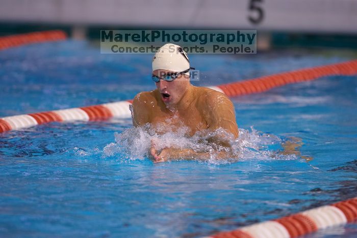 Georgia's Ashley Oliver was disqualified from the 200 yard breaststroke.  The University of Texas Longhorns defeated The University of Georgia Bulldogs 157-135 on Saturday, January 12, 2008.

Filename: SRM_20080112_1200588.jpg
Aperture: f/2.8
Shutter Speed: 1/400
Body: Canon EOS-1D Mark II
Lens: Canon EF 300mm f/2.8 L IS