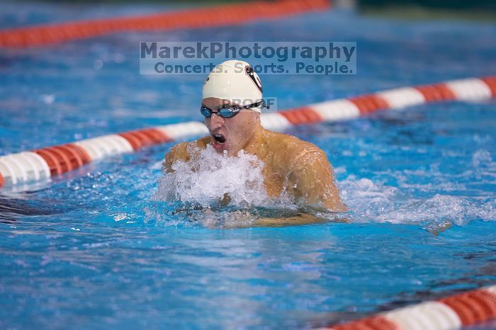 Georgia's Ashley Oliver was disqualified from the 200 yard breaststroke.  The University of Texas Longhorns defeated The University of Georgia Bulldogs 157-135 on Saturday, January 12, 2008.

Filename: SRM_20080112_1201021.jpg
Aperture: f/2.8
Shutter Speed: 1/400
Body: Canon EOS-1D Mark II
Lens: Canon EF 300mm f/2.8 L IS