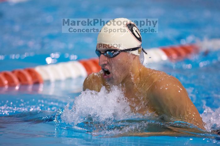 Georgia's Ashley Oliver was disqualified from the 200 yard breaststroke.  The University of Texas Longhorns defeated The University of Georgia Bulldogs 157-135 on Saturday, January 12, 2008.

Filename: SRM_20080112_1201221.jpg
Aperture: f/2.8
Shutter Speed: 1/400
Body: Canon EOS-1D Mark II
Lens: Canon EF 300mm f/2.8 L IS