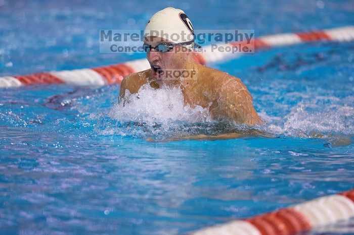 Georgia's Ashley Oliver was disqualified from the 200 yard breaststroke.  The University of Texas Longhorns defeated The University of Georgia Bulldogs 157-135 on Saturday, January 12, 2008.

Filename: SRM_20080112_1201242.jpg
Aperture: f/2.8
Shutter Speed: 1/400
Body: Canon EOS-1D Mark II
Lens: Canon EF 300mm f/2.8 L IS