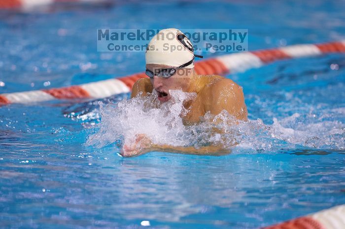 Georgia's Ashley Oliver was disqualified from the 200 yard breaststroke.  The University of Texas Longhorns defeated The University of Georgia Bulldogs 157-135 on Saturday, January 12, 2008.

Filename: SRM_20080112_1201263.jpg
Aperture: f/2.8
Shutter Speed: 1/400
Body: Canon EOS-1D Mark II
Lens: Canon EF 300mm f/2.8 L IS