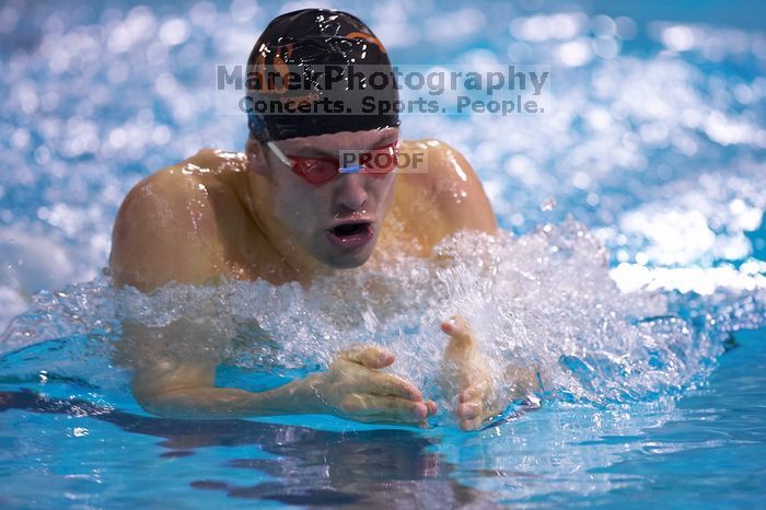 UT senior Matthew Lowe took first in the 200 yard breaststroke with a time of 2:01.46.  The University of Texas Longhorns defeated The University of Georgia Bulldogs 157-135 on Saturday, January 12, 2008.

Filename: SRM_20080112_1202064.jpg
Aperture: f/2.8
Shutter Speed: 1/400
Body: Canon EOS-1D Mark II
Lens: Canon EF 300mm f/2.8 L IS