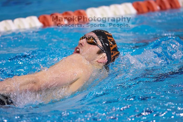 UT sophomore Trey Hoover competed in the 400 yard IM with a time of 4:10.06.  The University of Texas Longhorns defeated The University of Georgia Bulldogs 157-135 on Saturday, January 12, 2008.

Filename: SRM_20080112_1238564.jpg
Aperture: f/2.8
Shutter Speed: 1/400
Body: Canon EOS-1D Mark II
Lens: Canon EF 300mm f/2.8 L IS