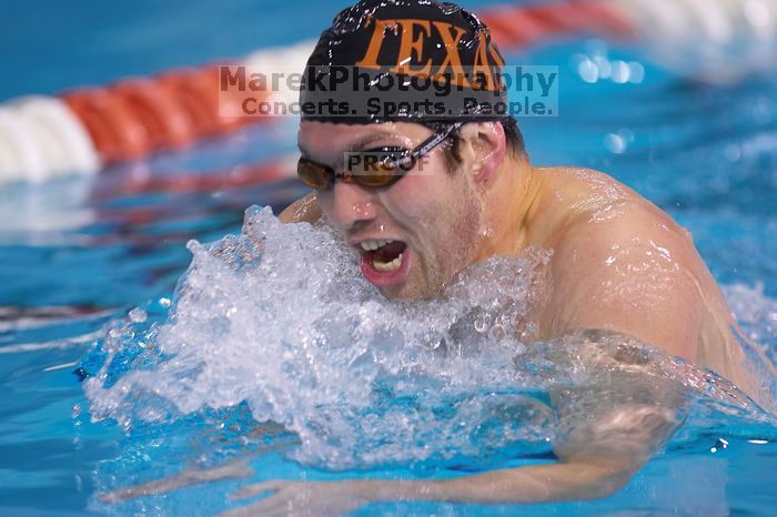 UT sophomore Trey Hoover competed in the 400 yard IM with a time of 4:10.06.  The University of Texas Longhorns defeated The University of Georgia Bulldogs 157-135 on Saturday, January 12, 2008.

Filename: SRM_20080112_1240088.jpg
Aperture: f/2.8
Shutter Speed: 1/400
Body: Canon EOS-1D Mark II
Lens: Canon EF 300mm f/2.8 L IS