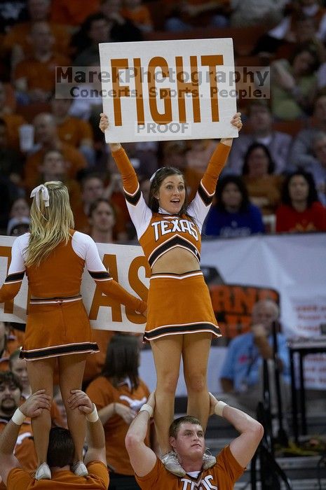 The University of Texas (UT) Longhorns defeated the University of Kansas Jayhawks 72-69 in Austin, Texas on Monday, February 11, 2008.

Filename: SRM_20080211_2052229.jpg
Aperture: f/2.8
Shutter Speed: 1/640
Body: Canon EOS 20D
Lens: Canon EF 300mm f/2.8 L IS