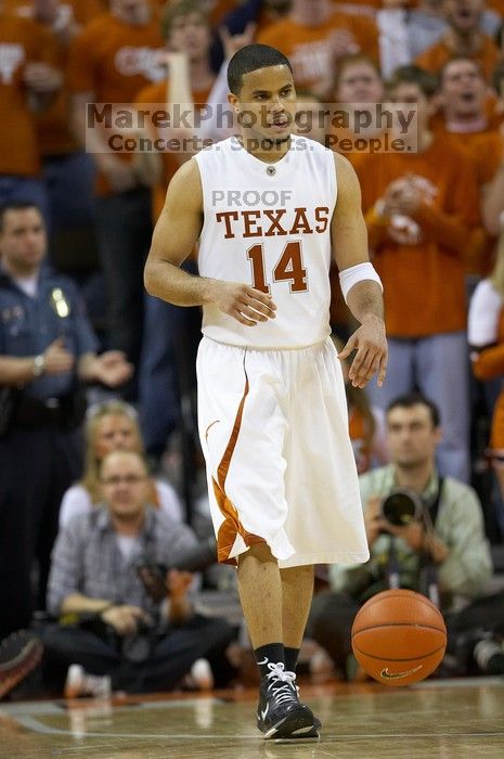 UT junior A.J. Abrams (#3, G) playing defense against a Kansas player.  The University of Texas (UT) Longhorns defeated the University of Kansas Jayhawks 72-69 in Austin, Texas on Monday, February 11, 2008.

Filename: SRM_20080211_2153260.jpg
Aperture: f/2.8
Shutter Speed: 1/640
Body: Canon EOS 20D
Lens: Canon EF 300mm f/2.8 L IS