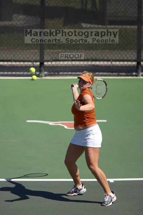 First doubles UT sophomore Vanja Corovic and UT junior Marija Milic defeated CSUS sophomore Aileen Tsan and CSUS junior Anastassia Lyssenko 8-3.  The University of Texas defeated Sacramento State on Saturday, March 22, 2008.

Filename: SRM_20080322_1114304.jpg
Aperture: f/4.0
Shutter Speed: 1/4000
Body: Canon EOS-1D Mark II
Lens: Canon EF 300mm f/2.8 L IS