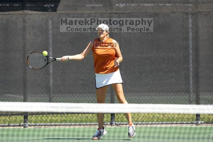 Second doubles UT freshman Maggie Mello and UT senior Courtney Zauft defeated CSUS junior Luba Schifris and CSUS junior Karina Jarlkaganova 8-4.  The University of Texas defeated Sacramento State on Saturday, March 22, 2008.

Filename: SRM_20080322_1143563.jpg
Aperture: f/4.0
Shutter Speed: 1/2500
Body: Canon EOS-1D Mark II
Lens: Canon EF 300mm f/2.8 L IS