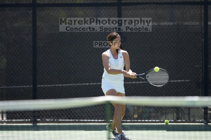 Fourth singles UT freshman Maggie Mello lost to CSUS junior Karina Jarlkaganova 6-7 (2), 4-6.  The University of Texas defeated Sacramento State on Saturday, March 22, 2008.

Filename: SRM_20080322_1245501.jpg
Aperture: f/2.8
Shutter Speed: 1/2000
Body: Canon EOS-1D Mark II
Lens: Canon EF 300mm f/2.8 L IS