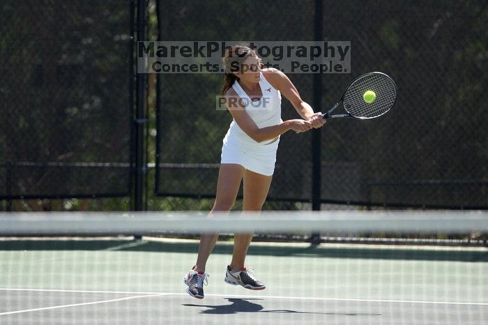 Fourth singles UT freshman Maggie Mello lost to CSUS junior Karina Jarlkaganova 6-7 (2), 4-6.  The University of Texas defeated Sacramento State on Saturday, March 22, 2008.

Filename: SRM_20080322_1246368.jpg
Aperture: f/2.8
Shutter Speed: 1/2000
Body: Canon EOS-1D Mark II
Lens: Canon EF 300mm f/2.8 L IS