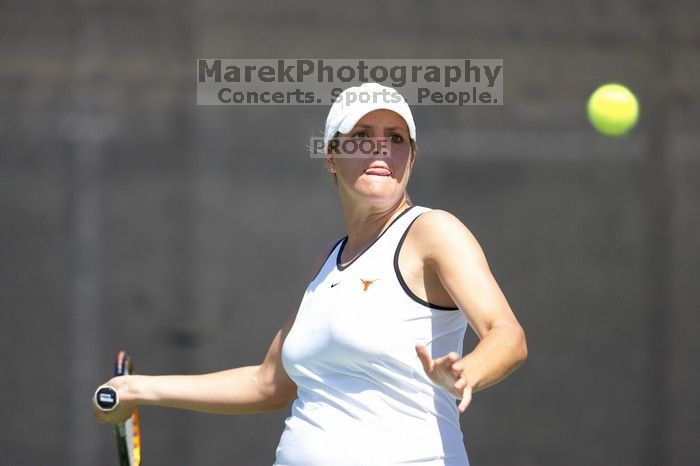 Second singles UT senior Courtney Zauft defeated CSUS junior Anastassia Lyssenko 4-6, 6-3, 10-6.  The University of Texas defeated Sacramento State on Saturday, March 22, 2008.

Filename: SRM_20080322_1316263.jpg
Aperture: f/2.8
Shutter Speed: 1/2500
Body: Canon EOS-1D Mark II
Lens: Canon EF 300mm f/2.8 L IS