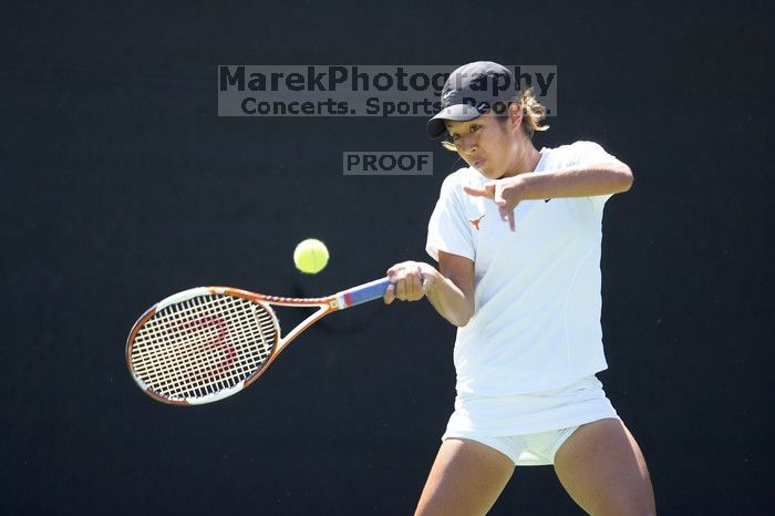 Third singles UT sophomore Stephanie Davison defeated CSUS junior Luba Schifris 7-5, 5-7, 16-14.  The University of Texas defeated Sacramento State on Saturday, March 22, 2008.

Filename: SRM_20080322_1322364.jpg
Aperture: f/2.8
Shutter Speed: 1/2000
Body: Canon EOS-1D Mark II
Lens: Canon EF 300mm f/2.8 L IS