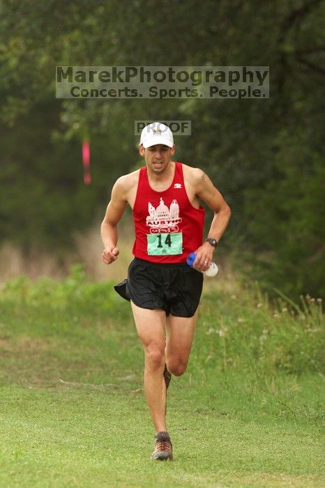 Paul Terranova  placed second overall in The Saint 30K trail race, sponsored by Rogue, at the Saint Stephen's Episcopal School on Sunday morning, June 29, 2008.

Filename: SRM_20080629_0909147.jpg
Aperture: f/4.0
Shutter Speed: 1/200
Body: Canon EOS 20D
Lens: Canon EF 300mm f/2.8 L IS