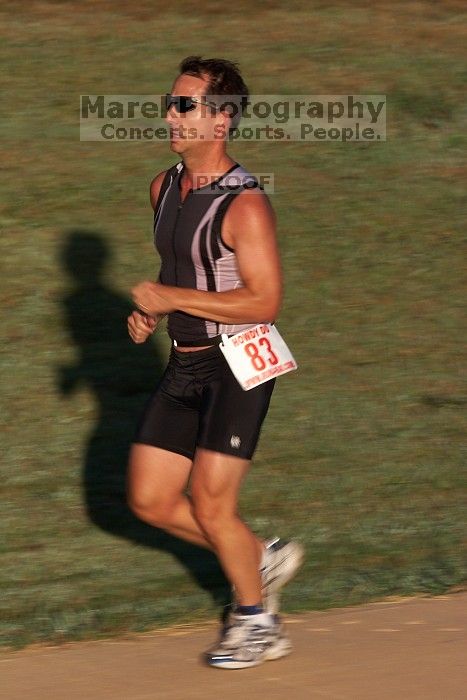 Kenric Miller (bib #83) of Austin placed 6 in his age group (M 45-49) with an overall time of 01:35:51 at The Howdy Du duathlon in Berry Springs Park, Georgetown, Sunday July 6, 2008.

Filename: SRM_20080706_0734140.jpg
Aperture: f/16.0
Shutter Speed: 1/80
Body: Canon EOS 20D
Lens: Canon EF 300mm f/2.8 L IS