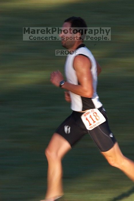 Tim Caglarcan (bib #118) of Austin placed 1 in his age group (M 35-39) with an overall time of 01:23:04 at The Howdy Du duathlon in Berry Springs Park, Georgetown, Sunday July 6, 2008.

Filename: SRM_20080706_0737548.jpg
Aperture: f/16.0
Shutter Speed: 1/30
Body: Canon EOS 20D
Lens: Canon EF 300mm f/2.8 L IS