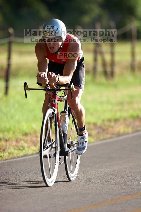 Derek Yorek (bib #128) of Austin placed 1 in his age group (M 25-29) with an overall time of 01:13:10 at The Howdy Du duathlon in Berry Springs Park, Georgetown, Sunday July 6, 2008.

Filename: SRM_20080706_0758185.jpg
Aperture: f/2.8
Shutter Speed: 1/1000
Body: Canon EOS 20D
Lens: Canon EF 300mm f/2.8 L IS