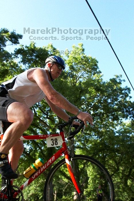 Matthew Phipps (bib #38) of Cedar Park placed 1 in his age group (M 0-39) with an overall time of 01:39:40 at The Howdy Du duathlon in Berry Springs Park, Georgetown, Sunday July 6, 2008.

Filename: SRM_20080706_0833328.jpg
Aperture: f/5.6
Shutter Speed: 1/1000
Body: Canon EOS 20D
Lens: Canon EF 16-35mm f/2.8 L