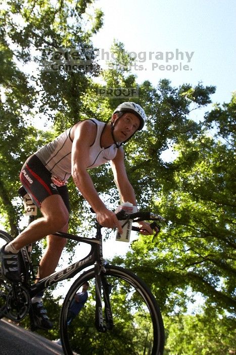 Max Hauser (bib #115) of Garland placed 4 in his age group (M 45-49) with an overall time of 01:33:33 at The Howdy Du duathlon in Berry Springs Park, Georgetown, Sunday July 6, 2008.

Filename: SRM_20080706_0834020.jpg
Aperture: f/5.6
Shutter Speed: 1/1000
Body: Canon EOS 20D
Lens: Canon EF 16-35mm f/2.8 L