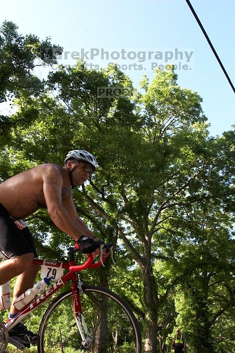 Philip Mallory (bib #79) of Round Rock placed 10 in his age group (M 35-39) with an overall time of 01:54:53 at The Howdy Du duathlon in Berry Springs Park, Georgetown, Sunday July 6, 2008.

Filename: SRM_20080706_0837046.jpg
Aperture: f/5.6
Shutter Speed: 1/1000
Body: Canon EOS 20D
Lens: Canon EF 16-35mm f/2.8 L