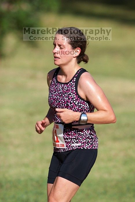 Beth Marek (bib #81) of Austin placed 4 in her age group (F 30-34) with an overall time of 01:46:51 at The Howdy Du duathlon in Berry Springs Park, Georgetown, Sunday July 6, 2008.

Filename: SRM_20080706_0907362.jpg
Aperture: f/4.0
Shutter Speed: 1/500
Body: Canon EOS 20D
Lens: Canon EF 300mm f/2.8 L IS