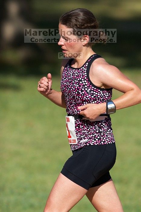 Beth Marek (bib #81) of Austin placed 4 in her age group (F 30-34) with an overall time of 01:46:51 at The Howdy Du duathlon in Berry Springs Park, Georgetown, Sunday July 6, 2008.

Filename: SRM_20080706_0907384.jpg
Aperture: f/4.0
Shutter Speed: 1/500
Body: Canon EOS 20D
Lens: Canon EF 300mm f/2.8 L IS