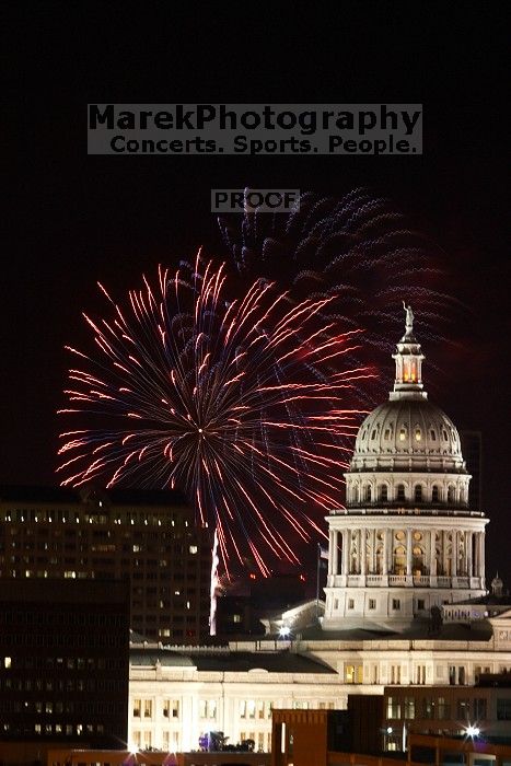 Austin Independence Day fireworks with the Capitol building, as viewed from atop the Manor Garage at The University of Texas at Austin.  The fireworks were launched from Auditorium Shores, downtown Austin, Friday, July 4, 2008.

Filename: SRM_20080704_2146242.jpg
Aperture: f/11.0
Shutter Speed: 5/1
Body: Canon EOS 20D
Lens: Canon EF 80-200mm f/2.8 L