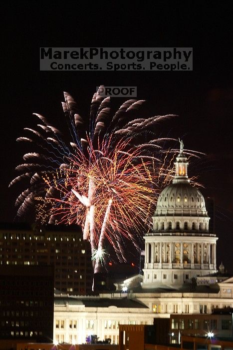 Austin Independence Day fireworks with the Capitol building, as viewed from atop the Manor Garage at The University of Texas at Austin.  The fireworks were launched from Auditorium Shores, downtown Austin, Friday, July 4, 2008.

Filename: SRM_20080704_2147568.jpg
Aperture: f/11.0
Shutter Speed: 5/1
Body: Canon EOS 20D
Lens: Canon EF 80-200mm f/2.8 L