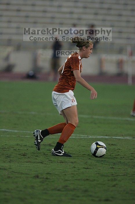 UT freshman Kylie Doniak (#15, Midfielder).  The University of Texas women's soccer team tied 0-0 against the Texas A&M Aggies Friday night, September 27, 2008.

Filename: SRM_20080926_1911101.jpg
Aperture: f/4.0
Shutter Speed: 1/1000
Body: Canon EOS-1D Mark II
Lens: Canon EF 300mm f/2.8 L IS