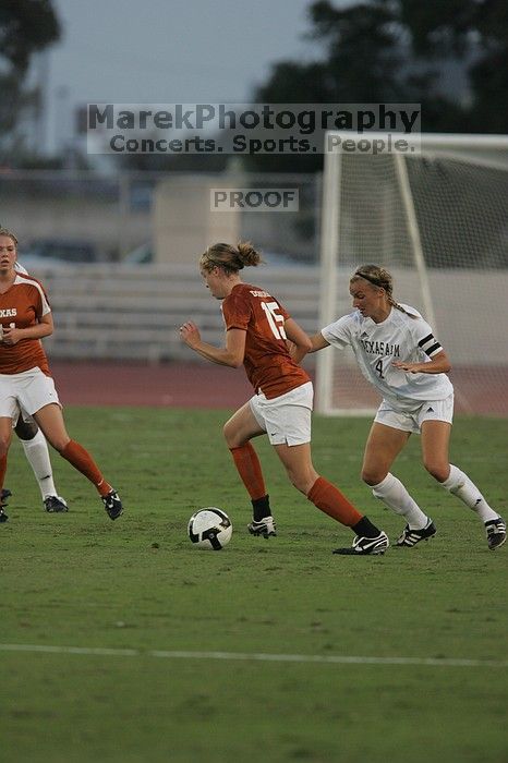 UT freshman Kylie Doniak (#15, Midfielder).  The University of Texas women's soccer team tied 0-0 against the Texas A&M Aggies Friday night, September 27, 2008.

Filename: SRM_20080926_1911202.jpg
Aperture: f/4.0
Shutter Speed: 1/800
Body: Canon EOS-1D Mark II
Lens: Canon EF 300mm f/2.8 L IS