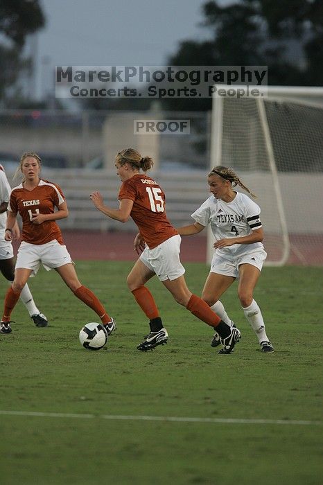 UT freshman Kylie Doniak (#15, Midfielder).  The University of Texas women's soccer team tied 0-0 against the Texas A&M Aggies Friday night, September 27, 2008.

Filename: SRM_20080926_1911203.jpg
Aperture: f/4.0
Shutter Speed: 1/800
Body: Canon EOS-1D Mark II
Lens: Canon EF 300mm f/2.8 L IS