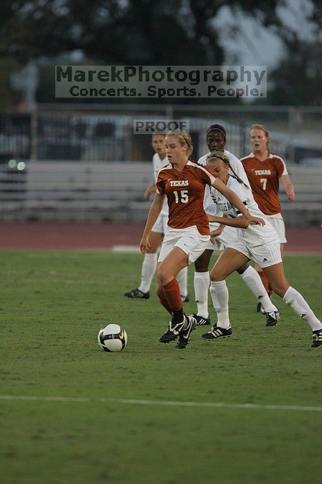 UT freshman Kylie Doniak (#15, Midfielder).  The University of Texas women's soccer team tied 0-0 against the Texas A&M Aggies Friday night, September 27, 2008.

Filename: SRM_20080926_1911224.jpg
Aperture: f/4.0
Shutter Speed: 1/800
Body: Canon EOS-1D Mark II
Lens: Canon EF 300mm f/2.8 L IS