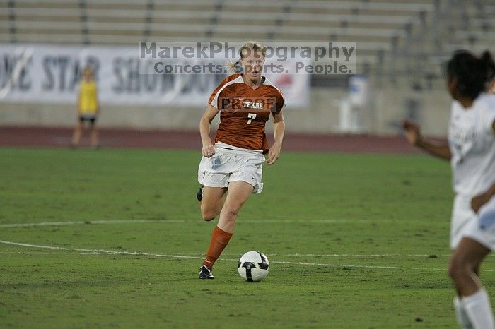 UT freshman Courtney Goodson (#7, Forward and Midfielder).  The University of Texas women's soccer team tied 0-0 against the Texas A&M Aggies Friday night, September 27, 2008.

Filename: SRM_20080926_1924248.jpg
Aperture: f/4.0
Shutter Speed: 1/500
Body: Canon EOS-1D Mark II
Lens: Canon EF 300mm f/2.8 L IS