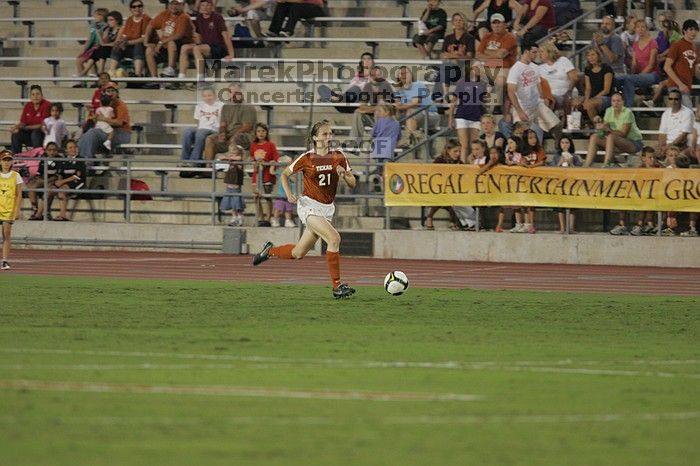 UT junior Emily Anderson (#21, Forward). The University of Texas women's soccer team tied 0-0 against the Texas A&M Aggies Friday night, September 27, 2008.
Filename: SRM_20080926_1930229.jpg
Aperture: f/4.0
Shutter Speed: 1/320
Body: Canon EOS-1D Mark II
Lens: Canon EF 300mm f/2.8 L IS