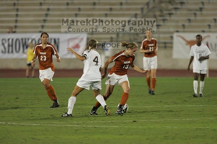 The University of Texas women's soccer team tied 0-0 against the Texas A&M Aggies Friday night, September 27, 2008.

Filename: SRM_20080926_1935067.jpg
Aperture: f/4.0
Shutter Speed: 1/500
Body: Canon EOS-1D Mark II
Lens: Canon EF 300mm f/2.8 L IS