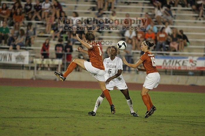 The University of Texas women's soccer team tied 0-0 against the Texas A&M Aggies Friday night, September 27, 2008.

Filename: SRM_20080926_2009141.jpg
Aperture: f/2.8
Shutter Speed: 1/500
Body: Canon EOS-1D Mark II
Lens: Canon EF 300mm f/2.8 L IS