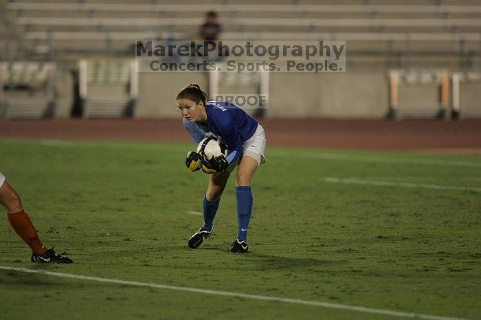 UT senior Dianna Pfenninger (#8, Goalkeeper) scoops up the ball.  The University of Texas women's soccer team tied 0-0 against the Texas A&M Aggies Friday night, September 27, 2008.

Filename: SRM_20080926_2014423.jpg
Aperture: f/2.8
Shutter Speed: 1/640
Body: Canon EOS-1D Mark II
Lens: Canon EF 300mm f/2.8 L IS