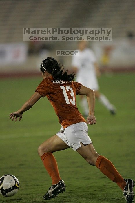 UT freshman Amanda Lisberger (#13, Midfielder).  The University of Texas women's soccer team tied 0-0 against the Texas A&M Aggies Friday night, September 27, 2008.

Filename: SRM_20080926_2027505.jpg
Aperture: f/2.8
Shutter Speed: 1/640
Body: Canon EOS-1D Mark II
Lens: Canon EF 300mm f/2.8 L IS