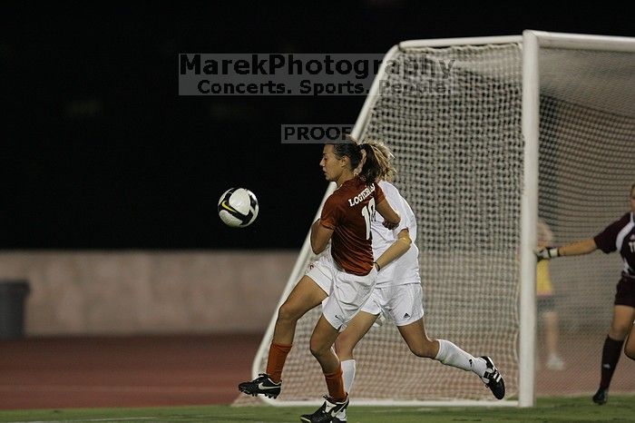 UT senior Stephanie Logterman (#10, Defender).  The University of Texas women's soccer team tied 0-0 against the Texas A&M Aggies Friday night, September 27, 2008.

Filename: SRM_20080926_2057584.jpg
Aperture: f/2.8
Shutter Speed: 1/640
Body: Canon EOS-1D Mark II
Lens: Canon EF 300mm f/2.8 L IS