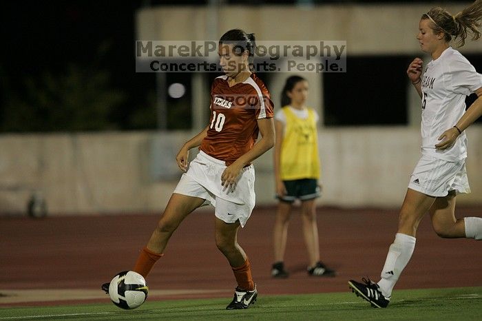 UT senior Stephanie Logterman (#10, Defender).  The University of Texas women's soccer team tied 0-0 against the Texas A&M Aggies Friday night, September 27, 2008.

Filename: SRM_20080926_2058025.jpg
Aperture: f/2.8
Shutter Speed: 1/640
Body: Canon EOS-1D Mark II
Lens: Canon EF 300mm f/2.8 L IS