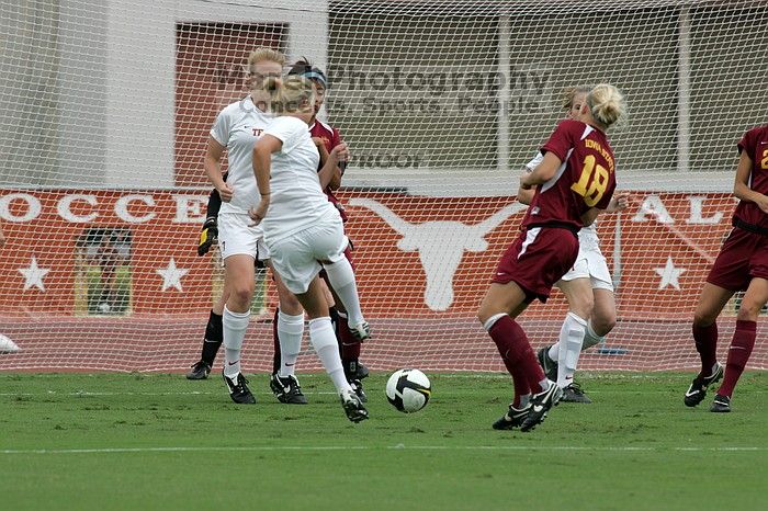 UT sophomore Niki Arlitt (#11, Forward) takes a shot on goal.  The University of Texas women's soccer team won 2-1 against the Iowa State Cyclones Sunday afternoon, October 5, 2008.

Filename: SRM_20081005_11594286.jpg
Aperture: f/8.0
Shutter Speed: 1/1000
Body: Canon EOS-1D Mark II
Lens: Canon EF 300mm f/2.8 L IS