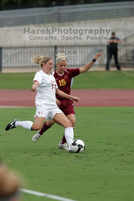 UT sophomore Niki Arlitt (#11, Forward) crosses the ball.  The University of Texas women's soccer team won 2-1 against the Iowa State Cyclones Sunday afternoon, October 5, 2008.

Filename: SRM_20081005_12014404.jpg
Aperture: f/5.6
Shutter Speed: 1/1600
Body: Canon EOS-1D Mark II
Lens: Canon EF 300mm f/2.8 L IS