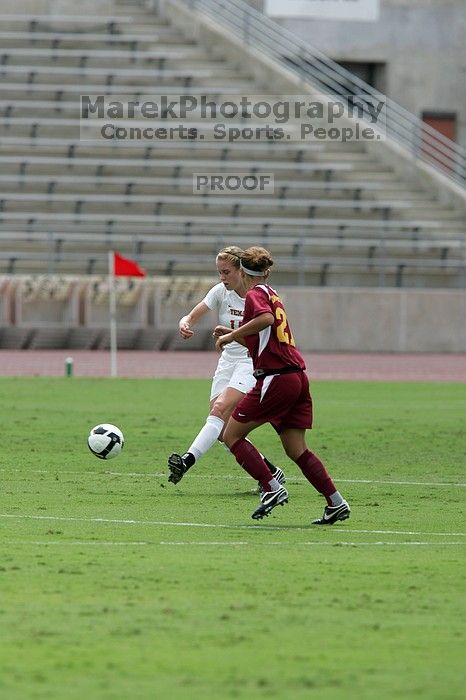 UT freshman Kylie Doniak (#15, Midfielder).  The University of Texas women's soccer team won 2-1 against the Iowa State Cyclones Sunday afternoon, October 5, 2008.

Filename: SRM_20081005_12114849.jpg
Aperture: f/5.6
Shutter Speed: 1/2000
Body: Canon EOS-1D Mark II
Lens: Canon EF 300mm f/2.8 L IS