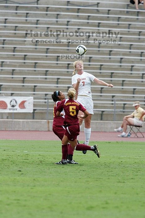 UT freshman Courtney Goodson (#7, Forward and Midfielder) heads the ball.  The University of Texas women's soccer team won 2-1 against the Iowa State Cyclones Sunday afternoon, October 5, 2008.

Filename: SRM_20081005_12115050.jpg
Aperture: f/5.6
Shutter Speed: 1/1250
Body: Canon EOS-1D Mark II
Lens: Canon EF 300mm f/2.8 L IS