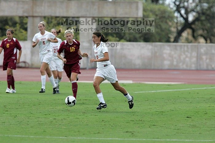 UT senior Stephanie Logterman (#10, Defender).  The University of Texas women's soccer team won 2-1 against the Iowa State Cyclones Sunday afternoon, October 5, 2008.

Filename: SRM_20081005_12122877.jpg
Aperture: f/5.6
Shutter Speed: 1/1600
Body: Canon EOS-1D Mark II
Lens: Canon EF 300mm f/2.8 L IS